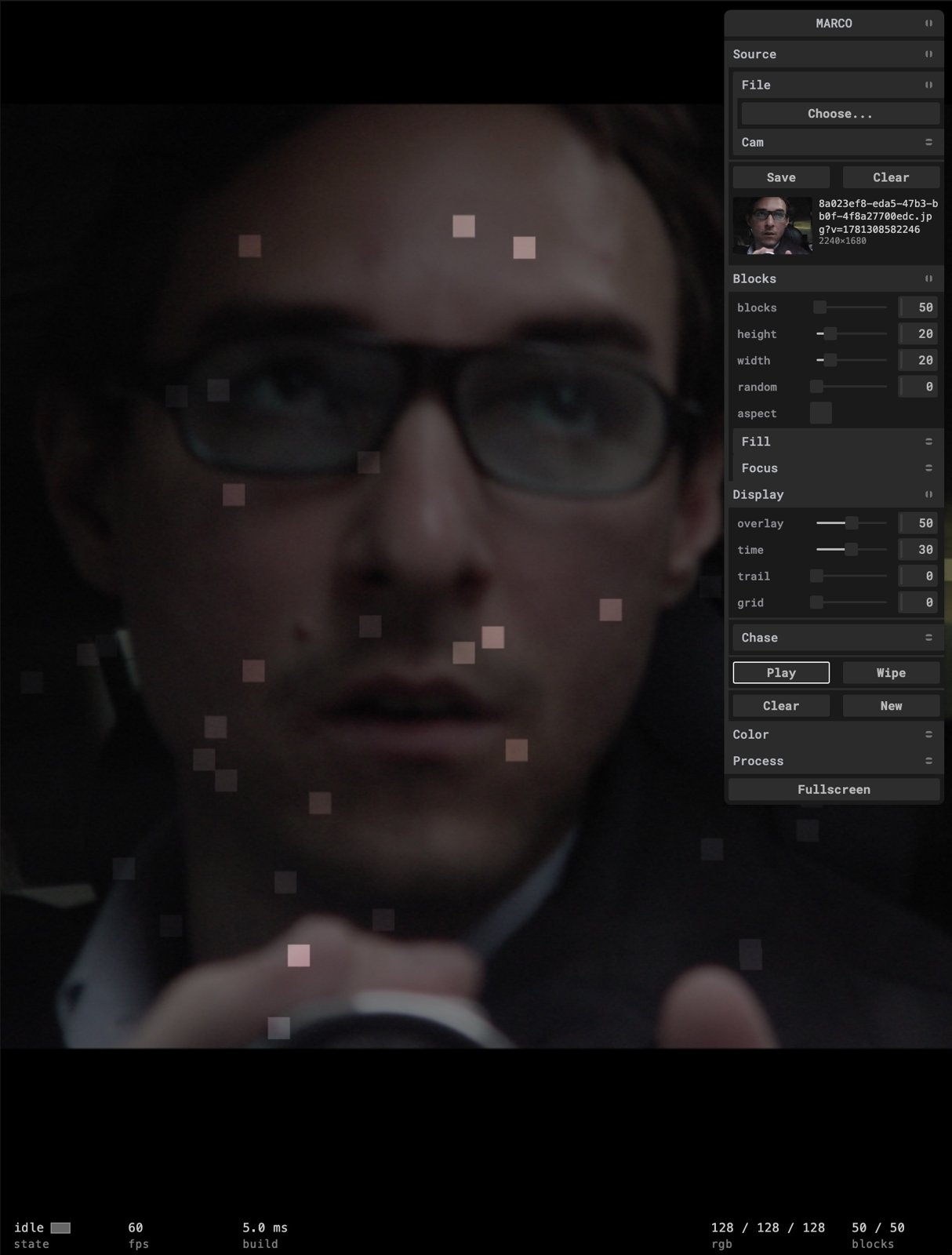 The MARCO NXT interface: a portrait overlaid with projected color blocks, beside a control panel